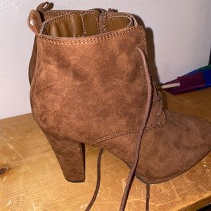 Brown high heeled booties